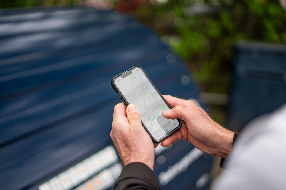 Phone being used to open Bikehangar